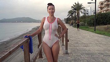 Soaked transparent swimsuit in public
